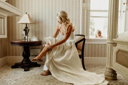 A bride gets ready for her wedding inside the mansion at the Norland Estate wedding venue in Alberta