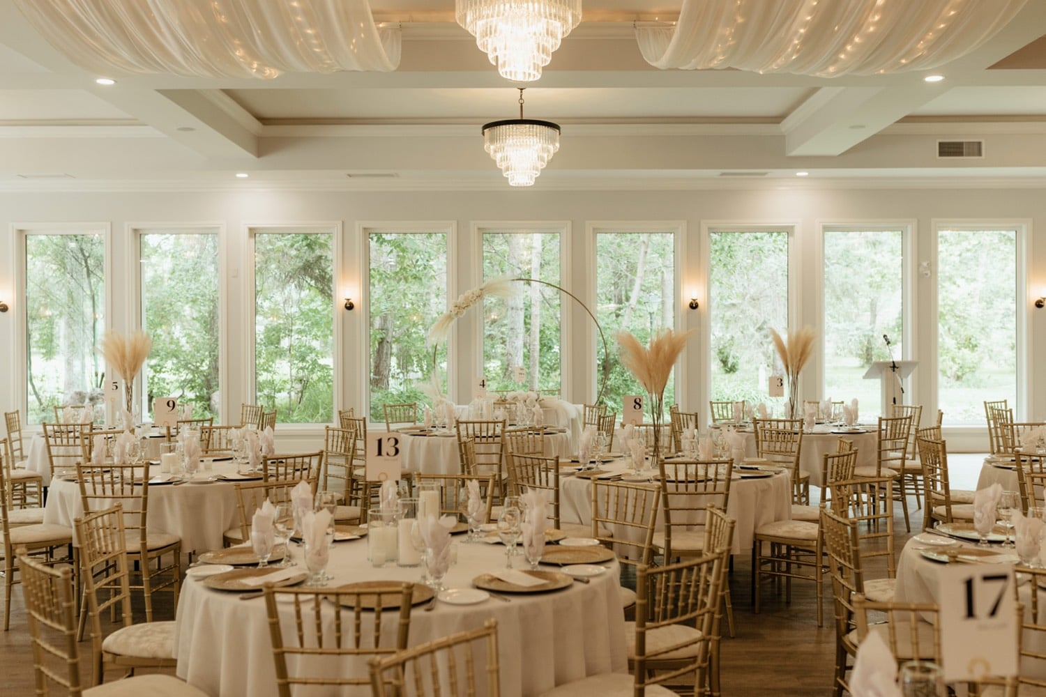 Indoor wedding venue decorated with tables